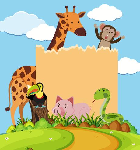 Border template with cute animals in park vector